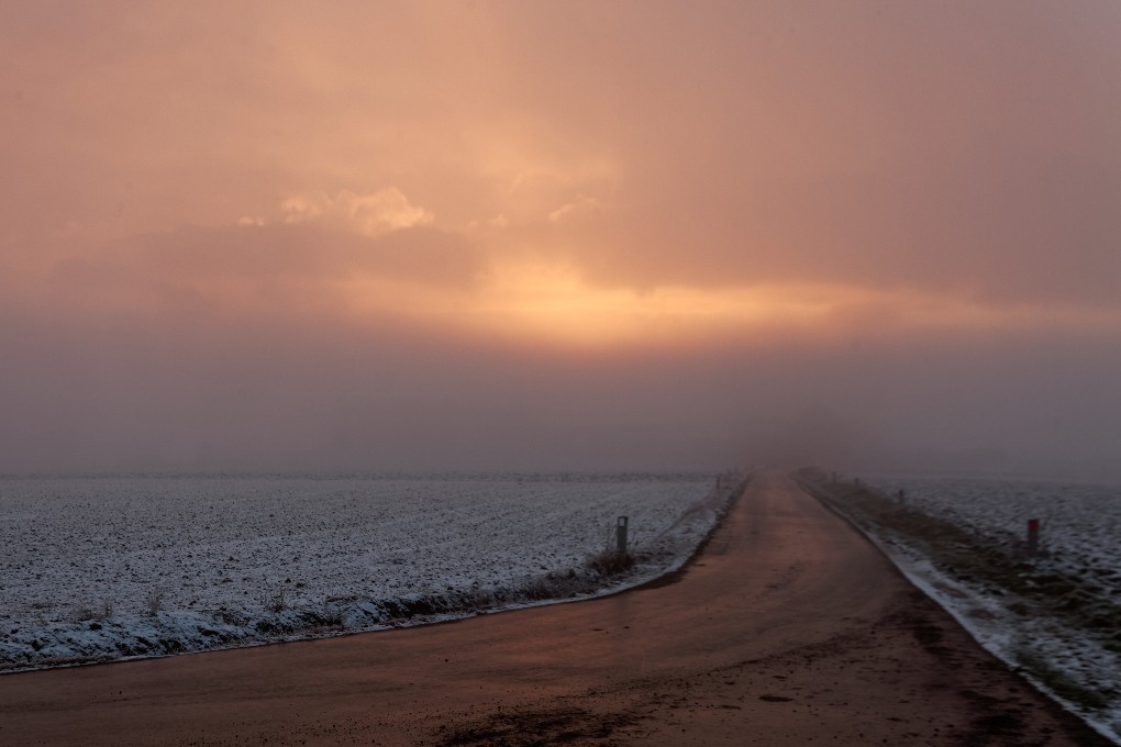 Winter sunset country road